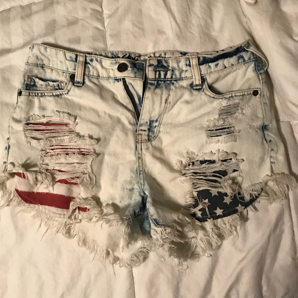 Acid wash jean cut-offs- American flag pockets